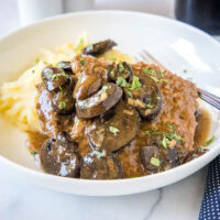 cropped close up cube steak with mushroom gravy