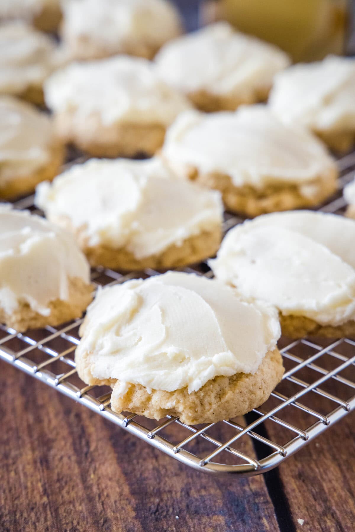 frosted eggnog cookies on a cooling rack