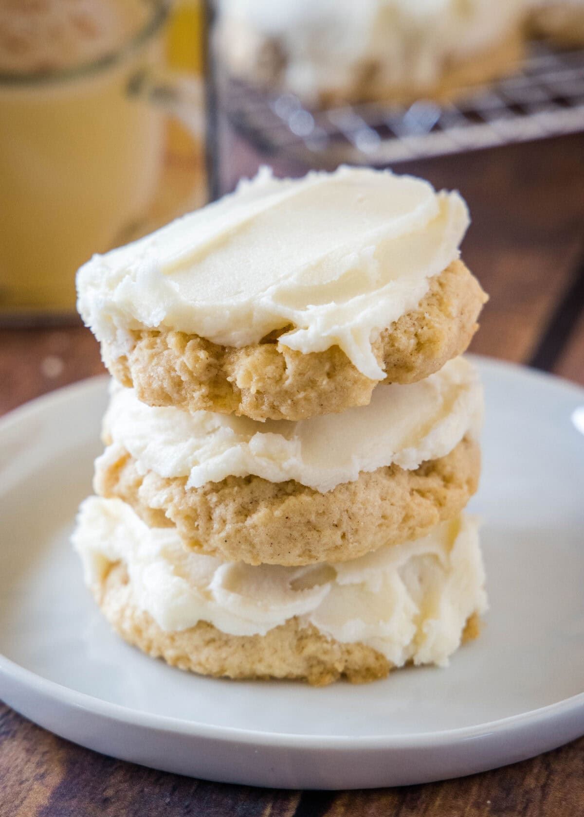 stack of eggnog cookies on a white plate