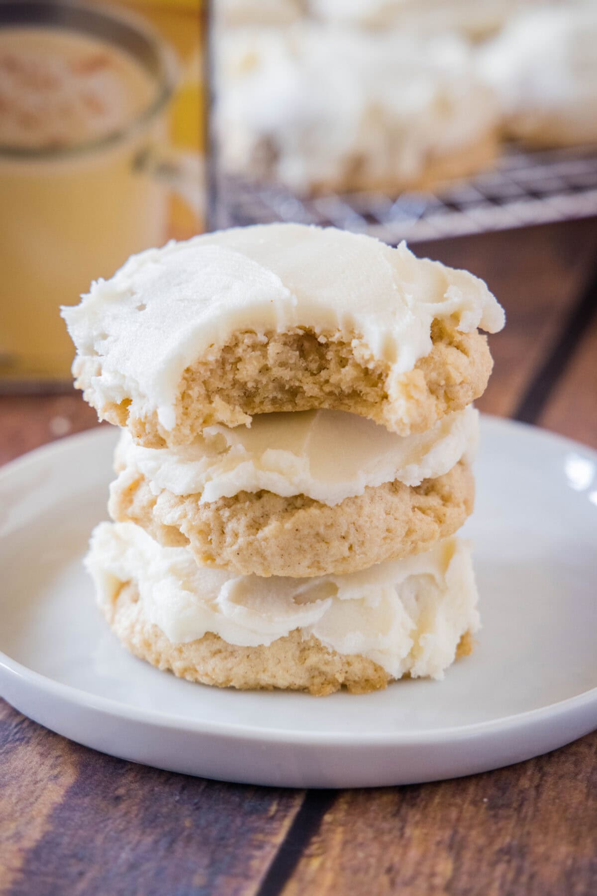 eggnog cookies staked with a bite taken out of one of them.