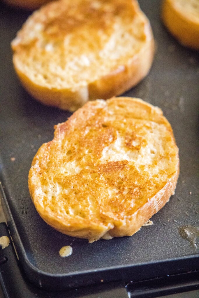 french toast cooking on a griddle