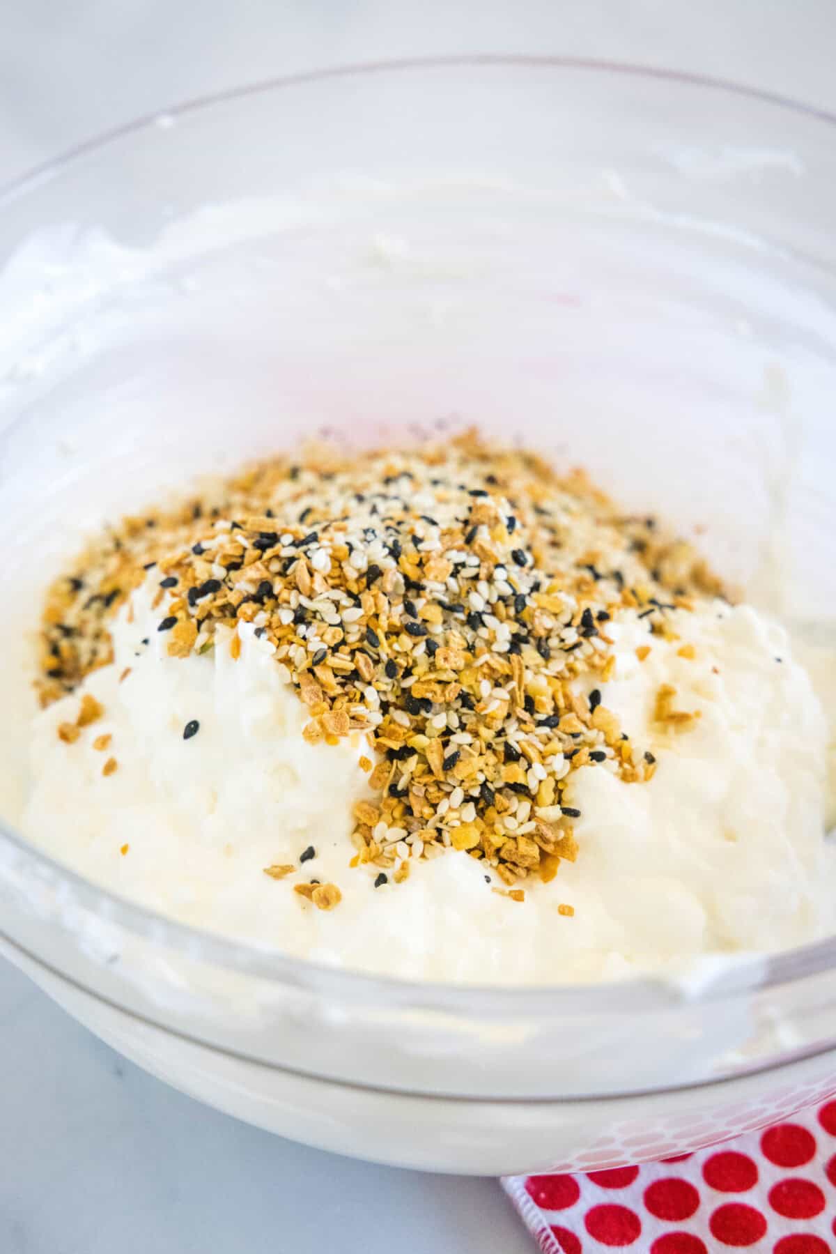 adding everything seasoning to cream cheese mixture