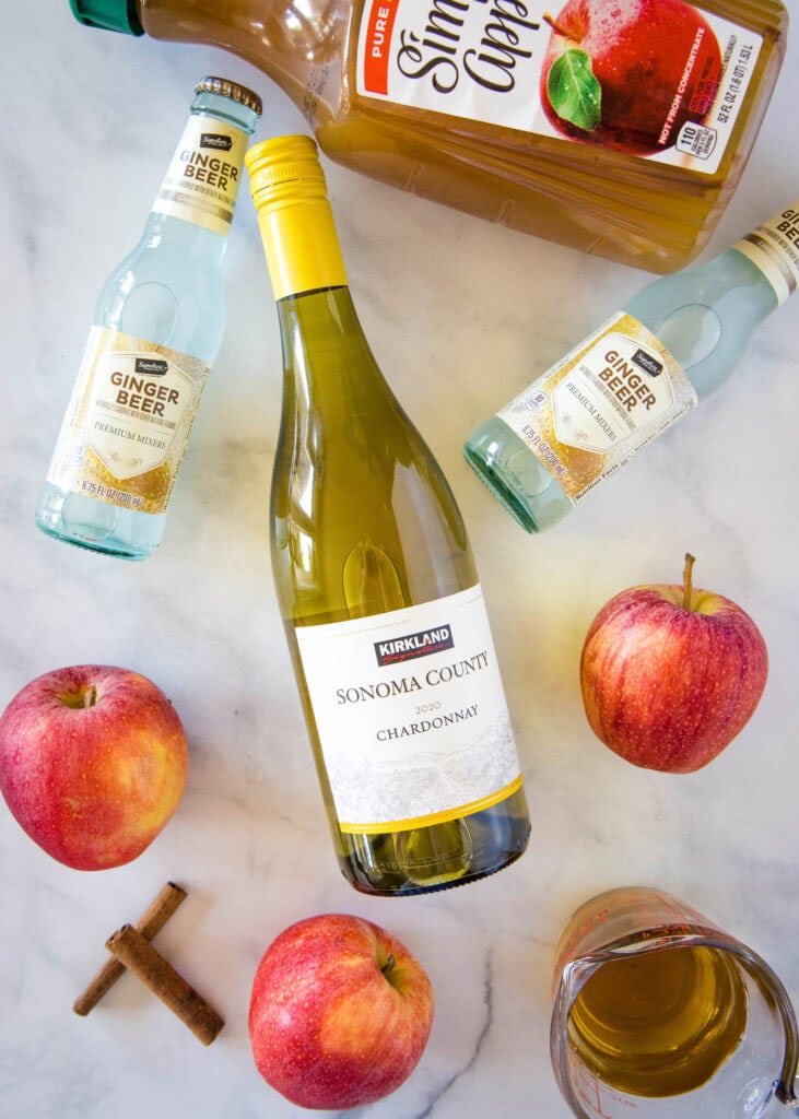 ingredients for fall sangria on a table