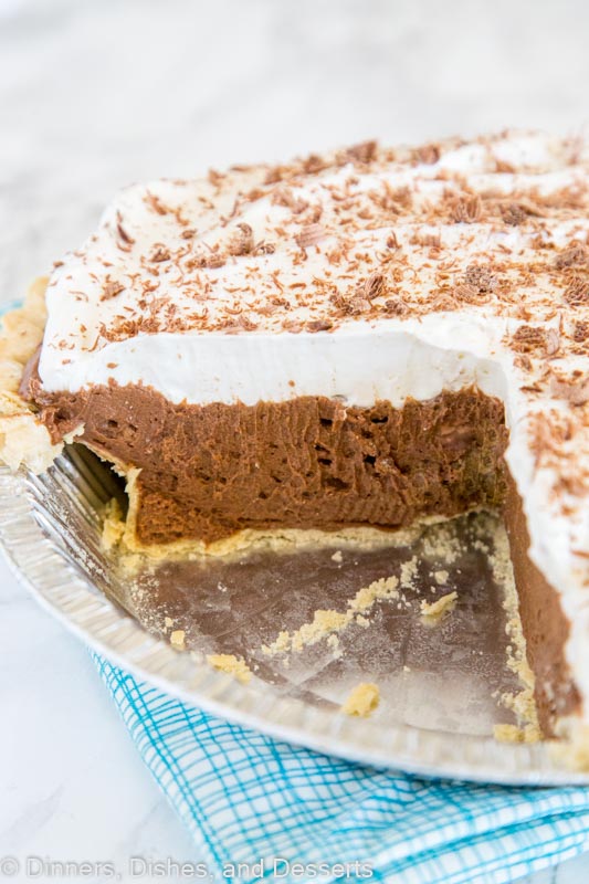 French Silk Pie - a rich and creamy chocolate pie with a layer of silky chocolate mousse topped with fresh whipped cream and chocolate shavings!  