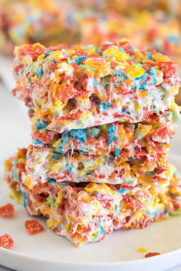 cropped close up fruity pebbles bars on a white plate