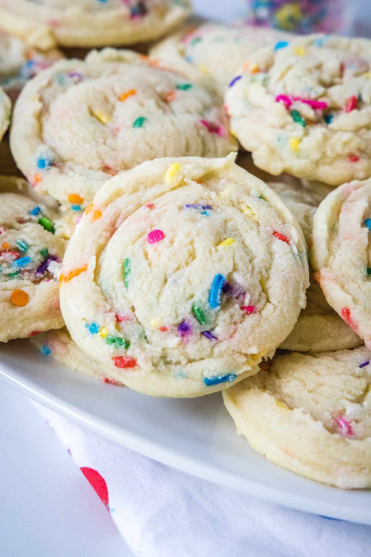 funfetti cookies on a white plate