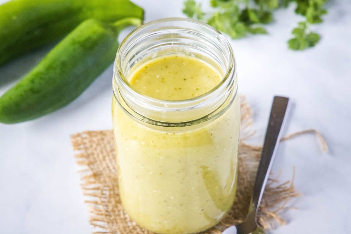 This Green Enchilada Sauce is a tangy flavorful sauce made with tomatillos, green chilies, garlic, and spices. It is super easy to make and beats the store bought sauce every time!
