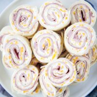 ham and cheese rolls up on a plate