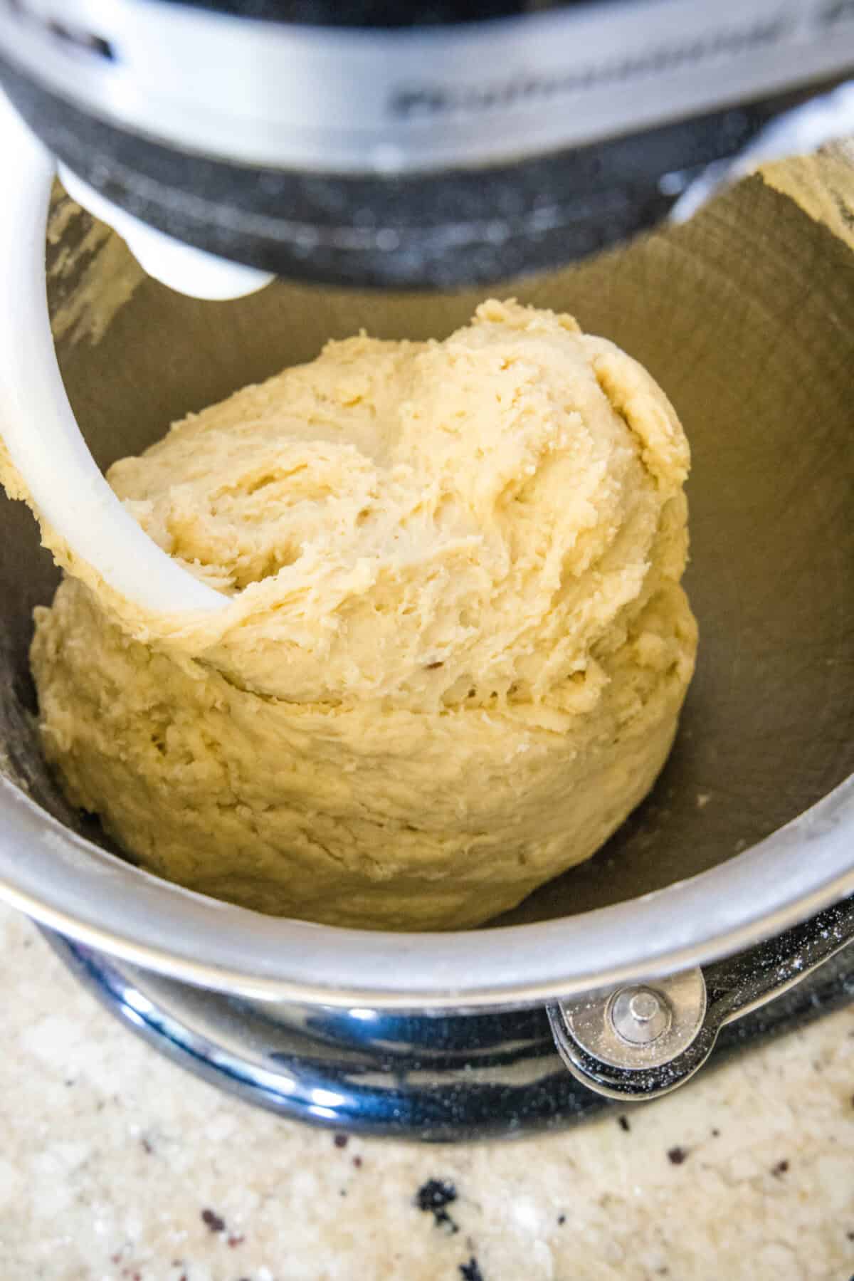 hawaiian roll dough in mixing bowl