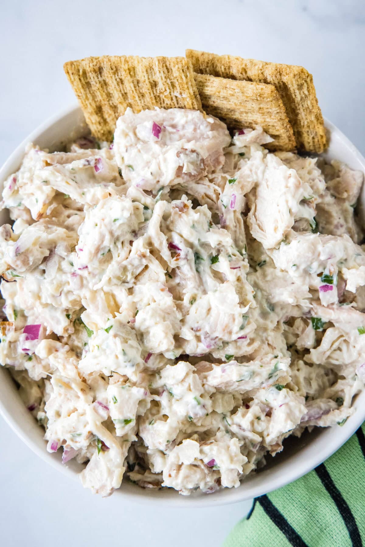 high protein chicken salad in a white bowl