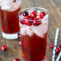 A close up of a glass red wine seltzer