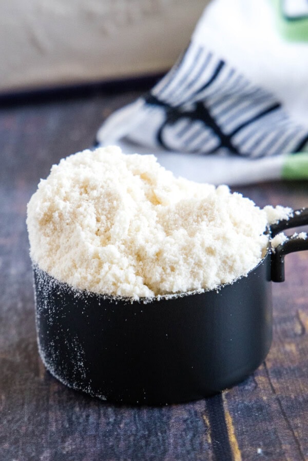 cropped close up measuring cup with bisquick