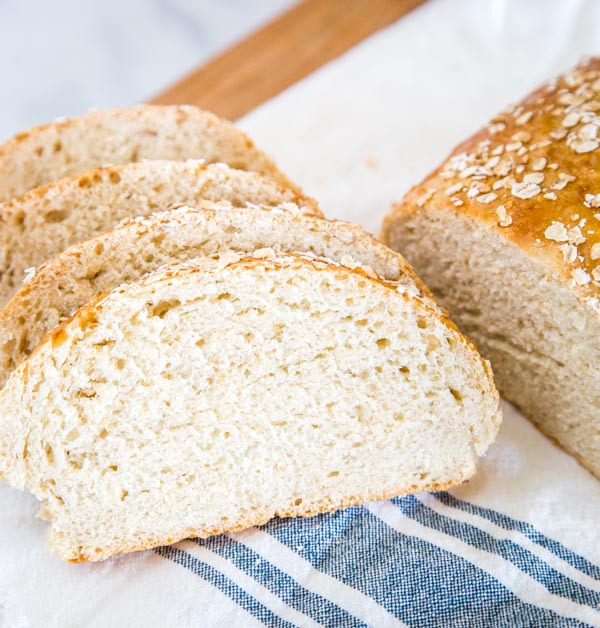 Honey Oat Bread - a soft and tender bread with oats and sweet honey.  This is an easy no-knead bread that is great for toast, sandwiches, or even with soup for dinner. 
