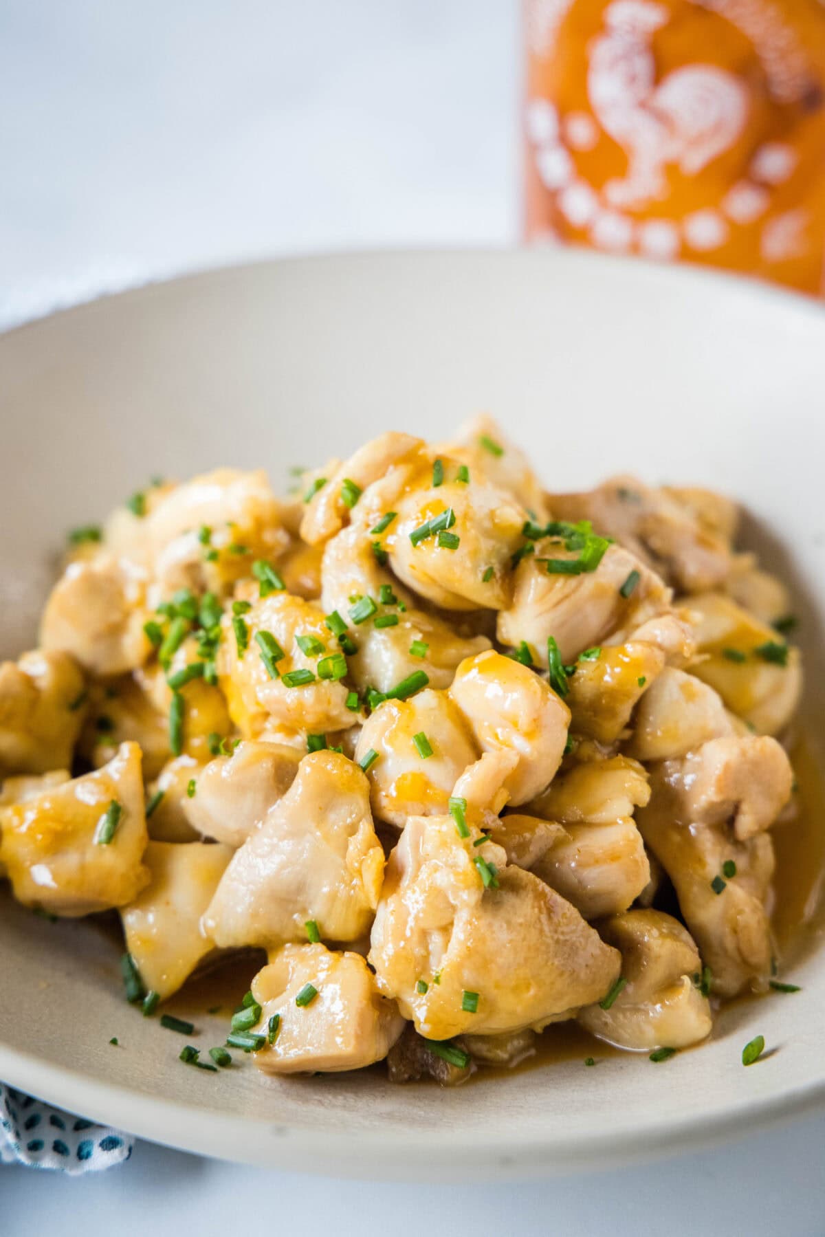 honey sriracha chicken bites in a serving bowl