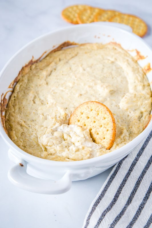 Easy hot artichoke dip can be made in minutes!  Great to make ahead for parties