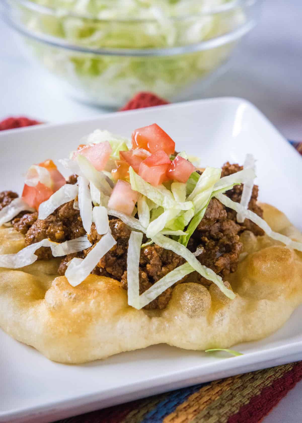navajo taco on a plate