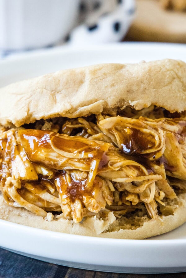 close up bbq chicken sandwich on a plate