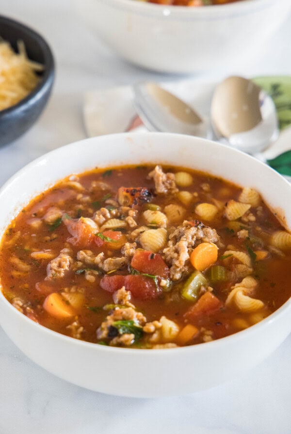 A bowl of Italian sausage soup.