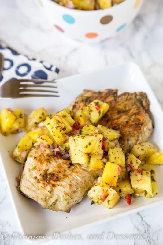 Jerk Chicken with Pineapple Salsa - a spicy and sweet grilled chicken recipe that comes together quickly. You will be craving the Tall, Dark & Delicious ice cream cake to cool down for dessert.