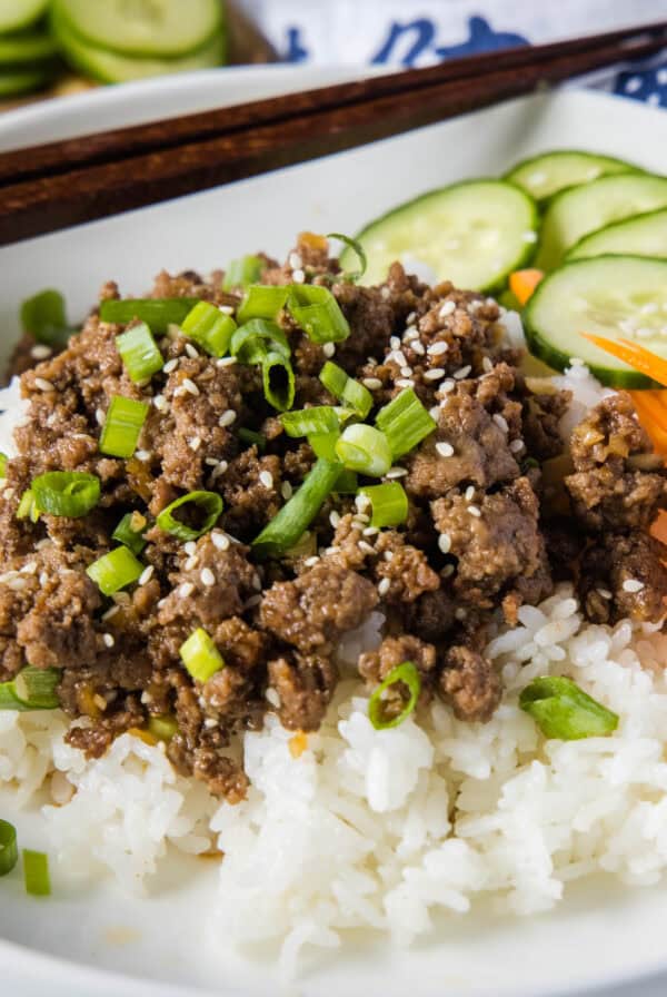 close up korean beef over rice on a plate