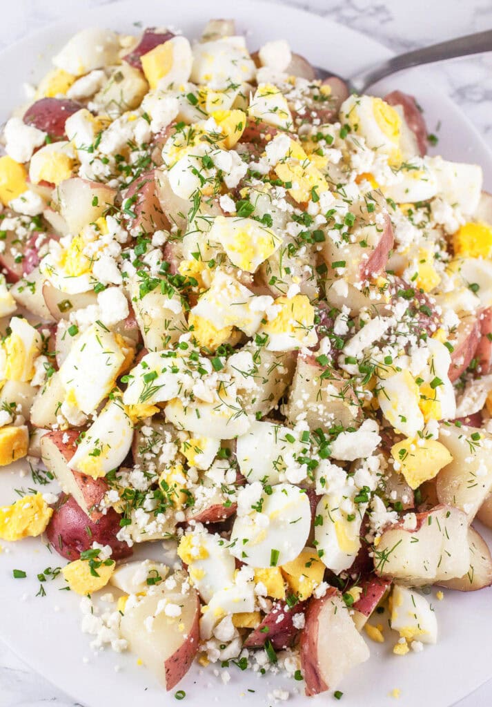 lemon herb potato salad on a platter