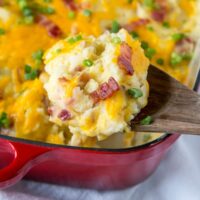 Loaded Twice Baked Potato Casserole - Turn twice baked potatoes into an easy cheesy potato casserole that will be sure to please. Loaded with garlic, cheese, and bacon!