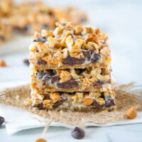 Magic Cookie Bars - These bars come together in one pan and are so easy to make.  Layers of graham crackers, chocolate, butterscotch, coconut, nuts and sweetened condensed milk.