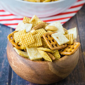 close up mexican snack mix in a wood bowl