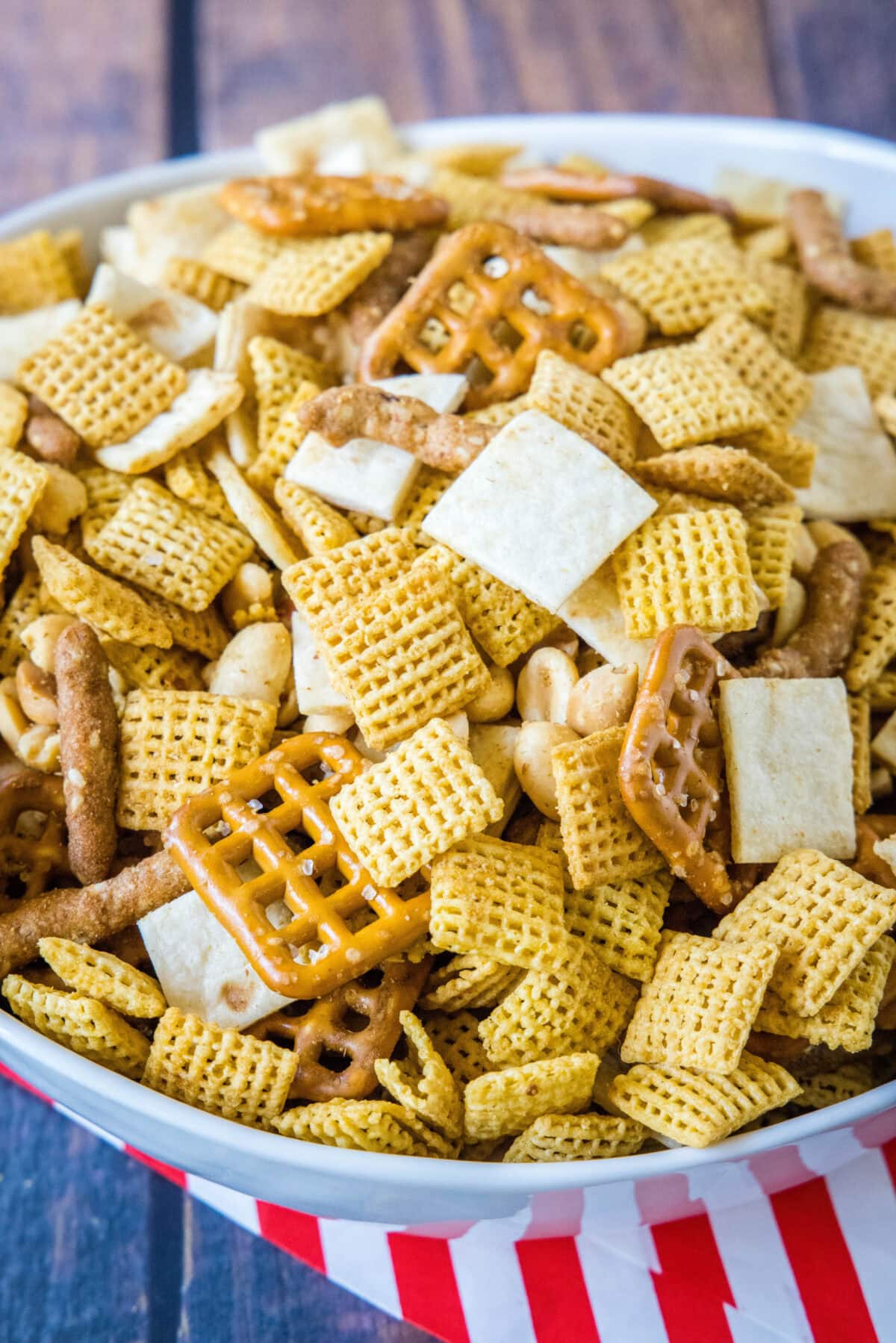a serving bowl with mexican snack mix
