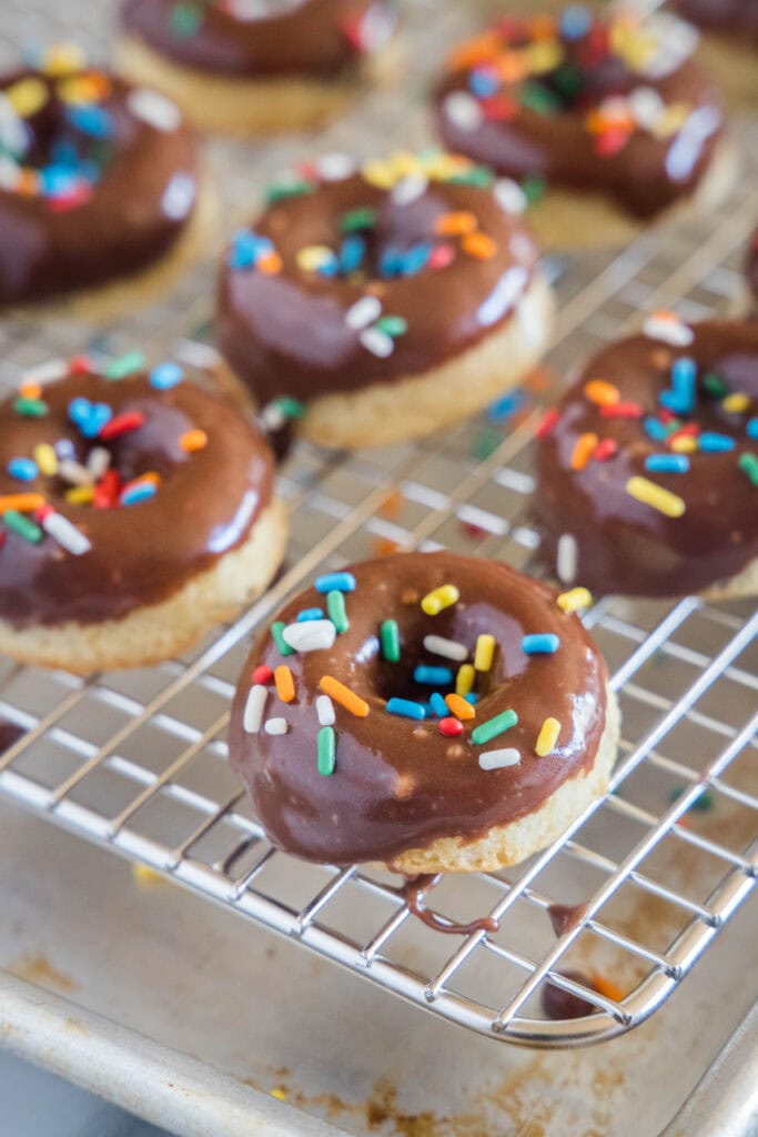 chocolate mini donuts on wire rack