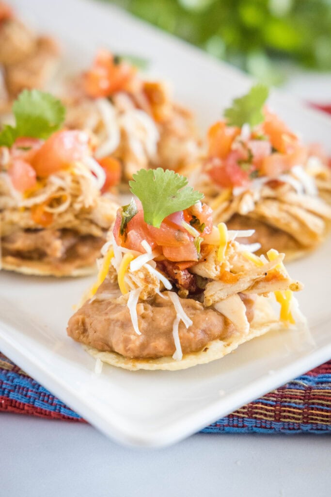 chicken and refried bean tostadas