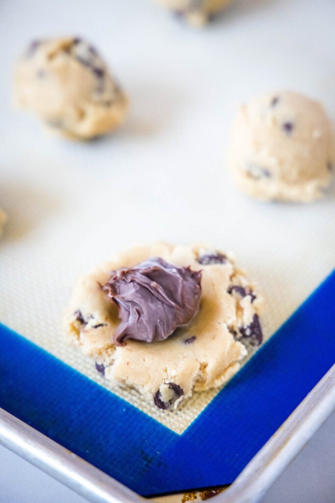 putting nutella balls inside cookie dough