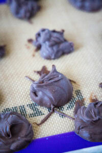 frozen balls of nutella on baking sheet