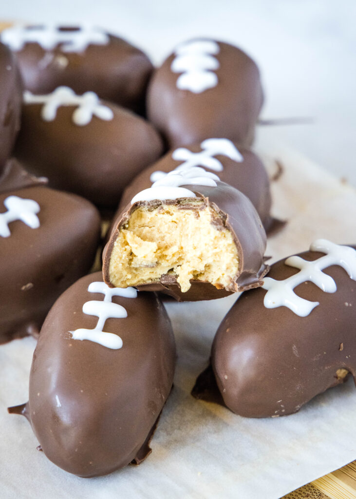 a bite taken out of a peanut butter football