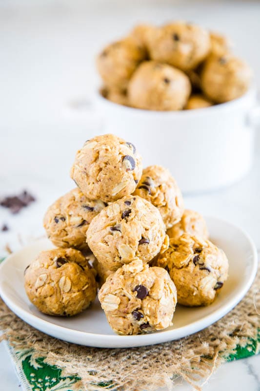 Homemade energy balls with peanut butter, flax seed, oats, honey, protein powder, and chocolate chips