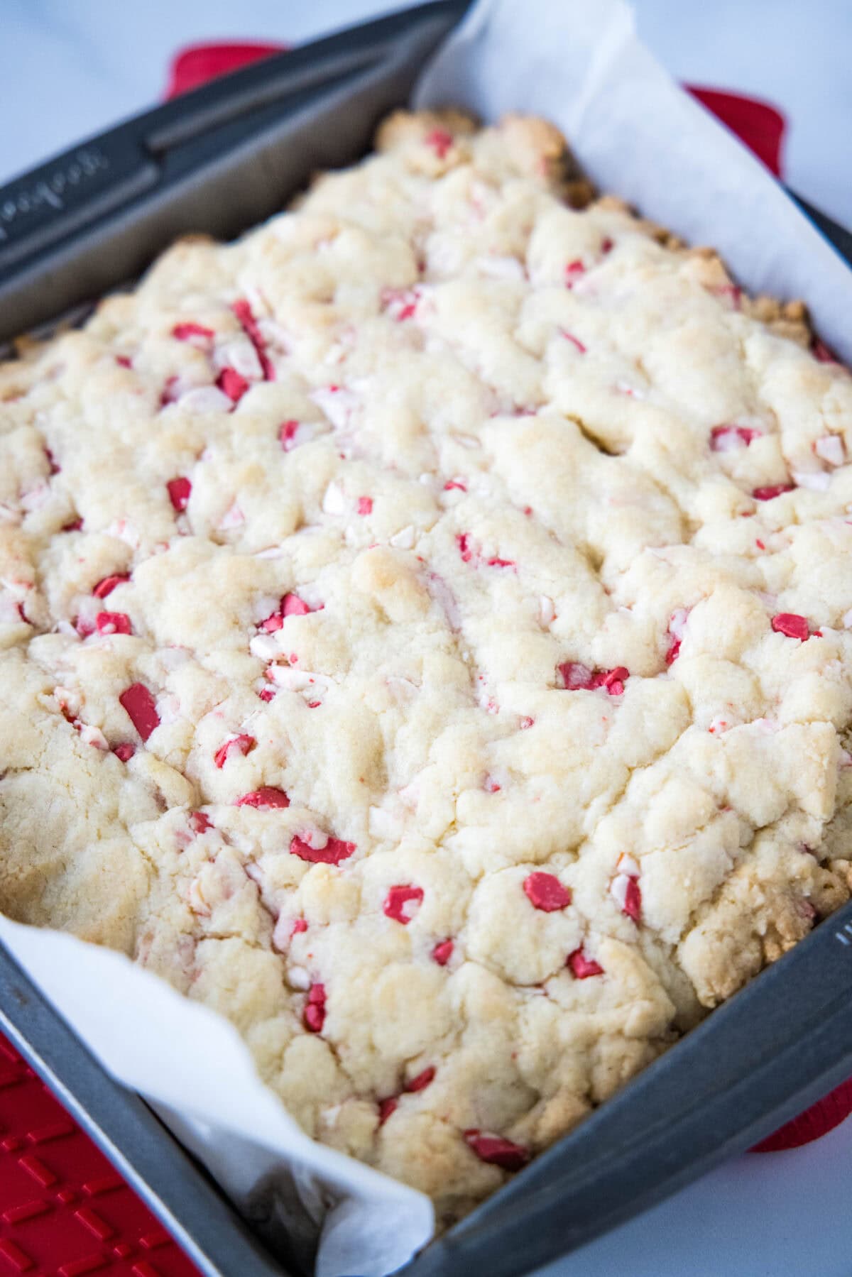baked peppermint sugar cookie bars in pan