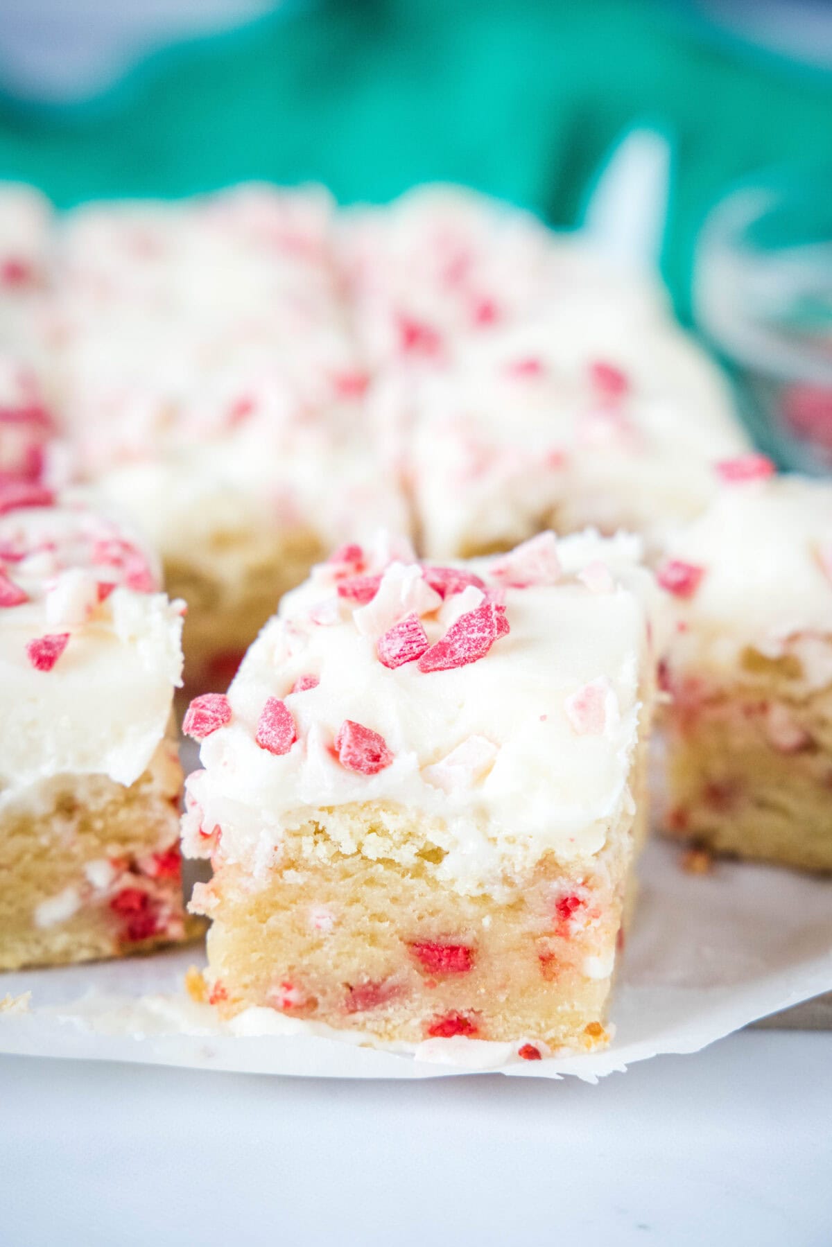 sliced peppermint sugar cookie bars on a board