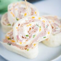 close up turkey pinwheel sandwich on a plate