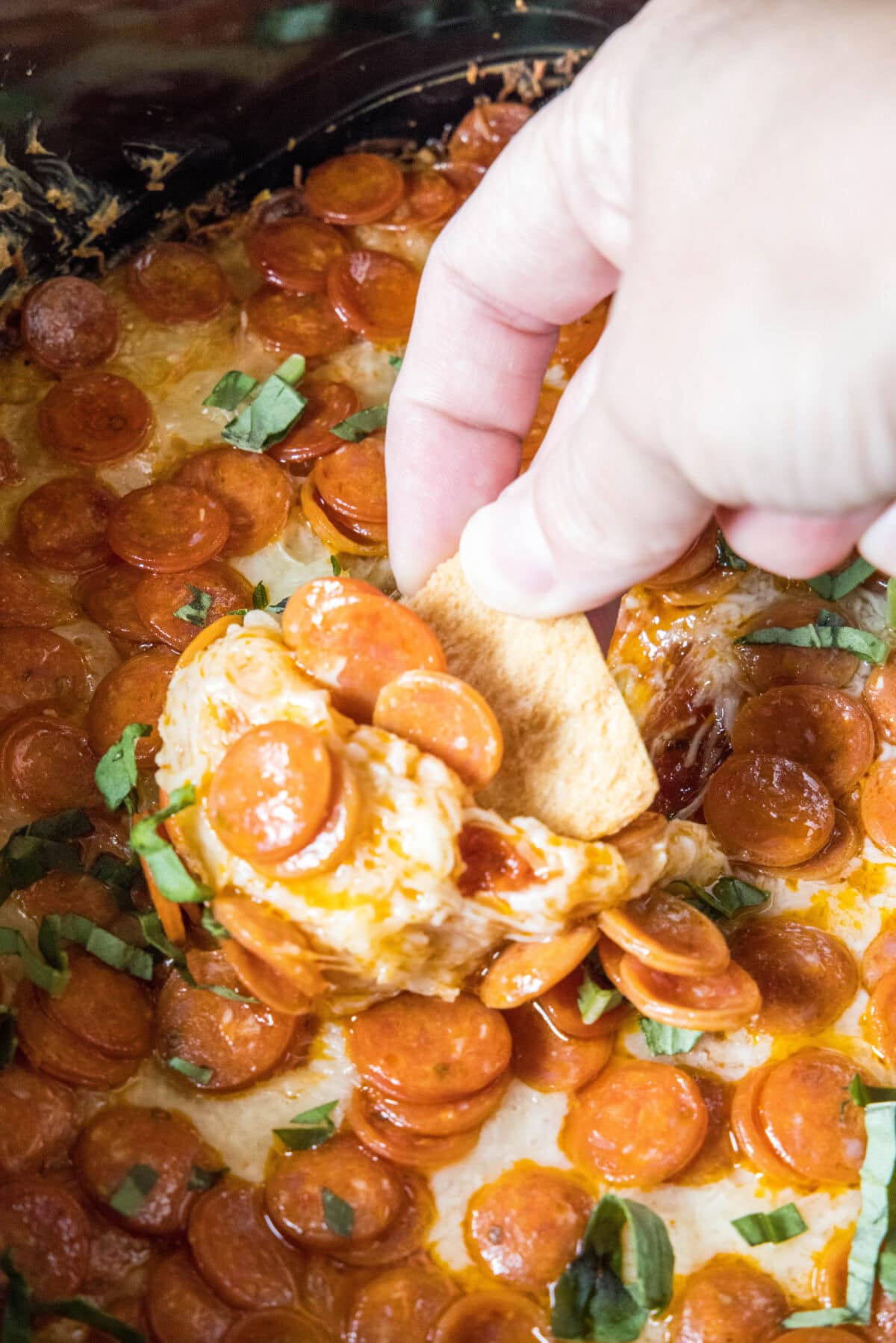 pizza dip on a pita chip