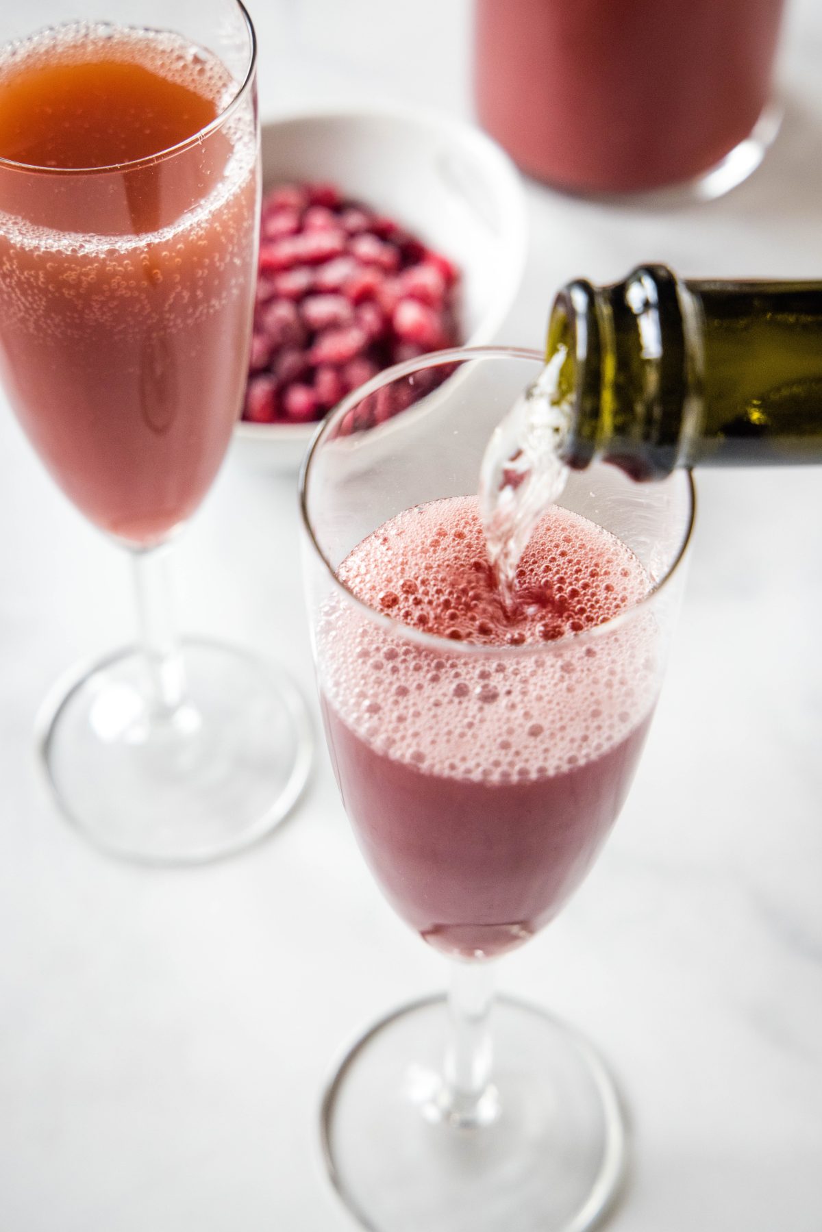 pouring champagne into a glass