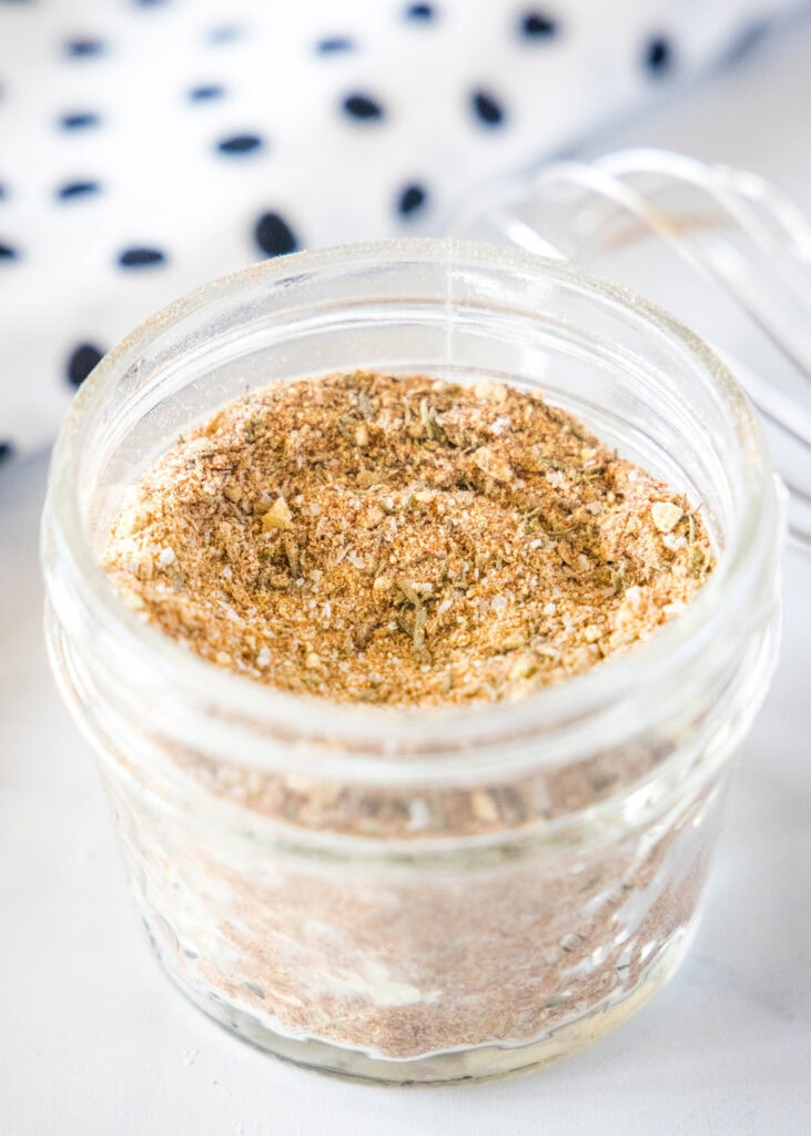 a jar filled with pork chop seasoning