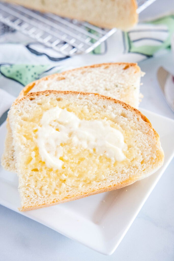 looking down on a toasted piece of bread with butter