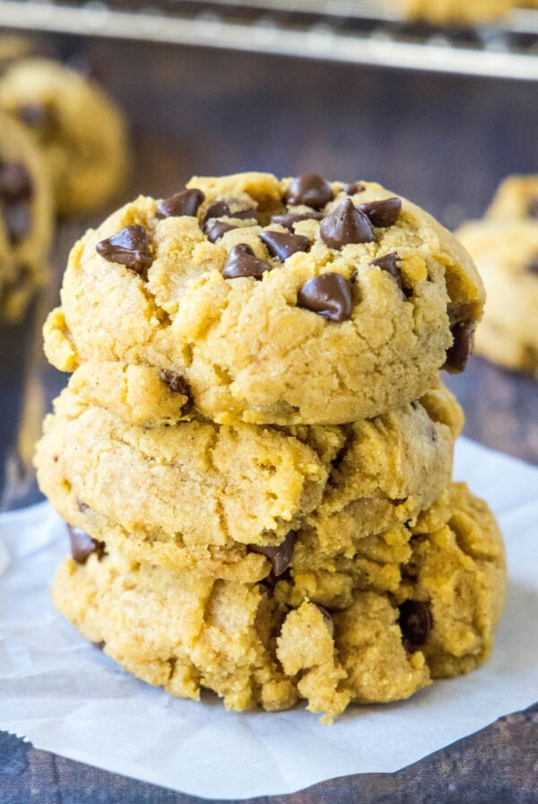 close up stack of pumpkin chocolate chip cookies
