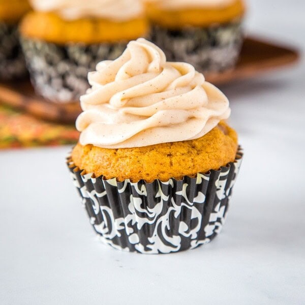 Pumpkin Spice Cupcakes with Cream Cheese Frosting - tender pumpkin cupcakes up all the delicious fall spices and topped with a cinnamon flavored cream cheese frosting.