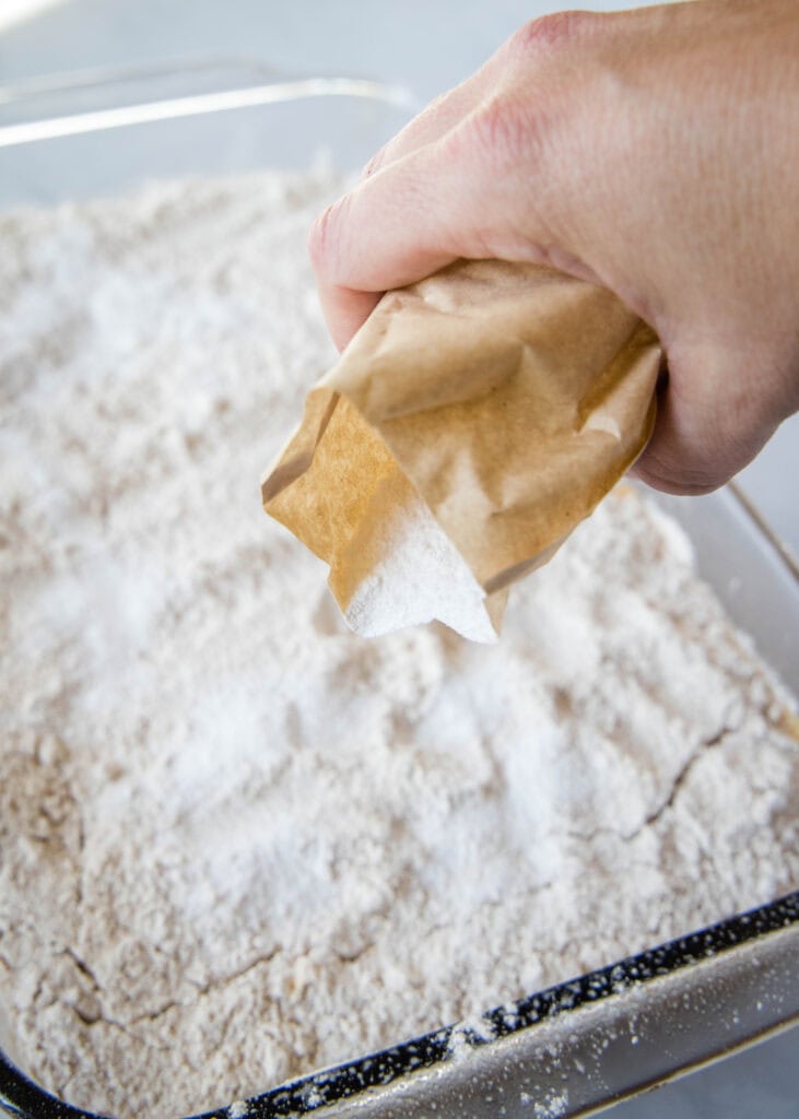 sprinkling pudding mix over dump cake