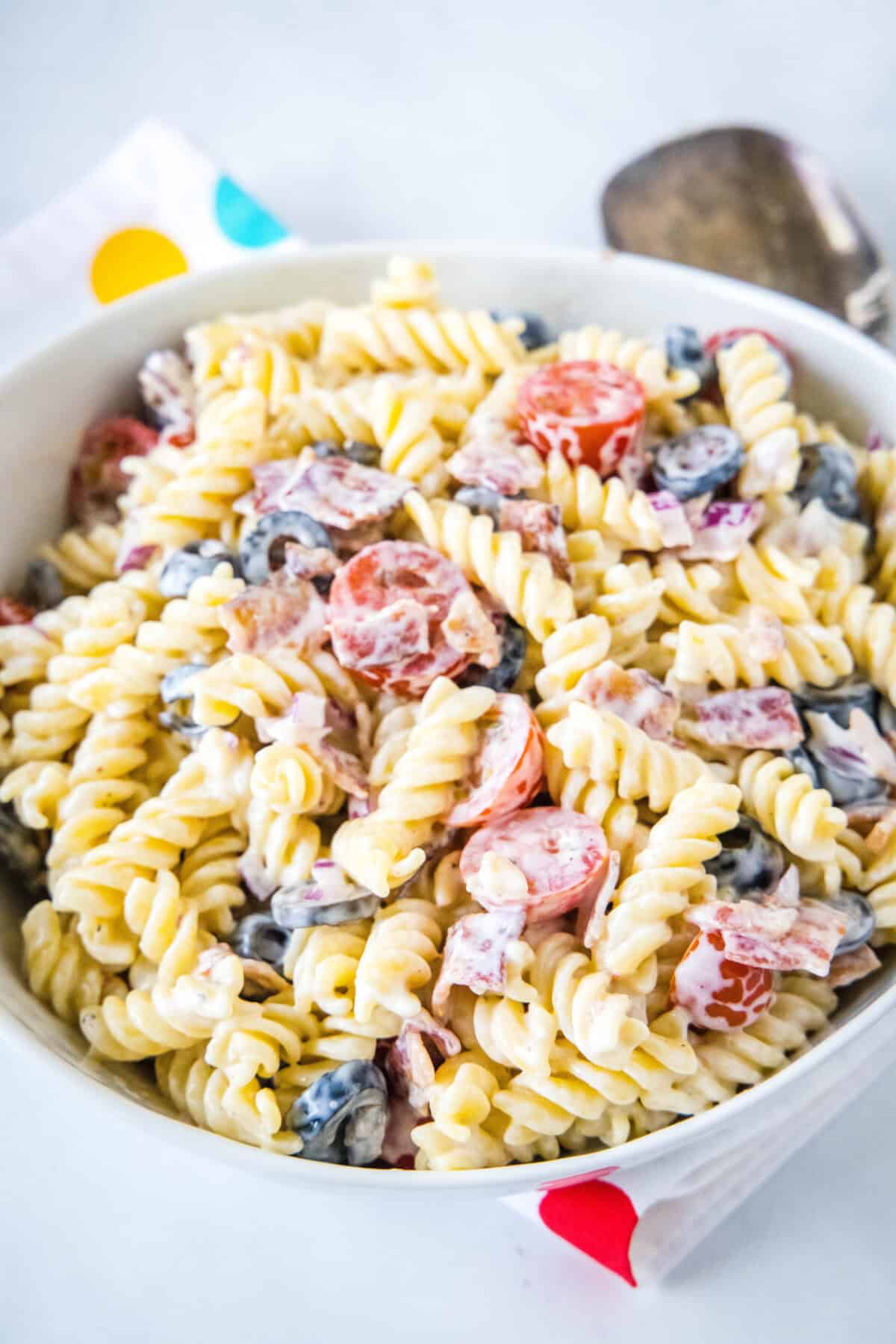 Ranch pasta salad in a white bowl.