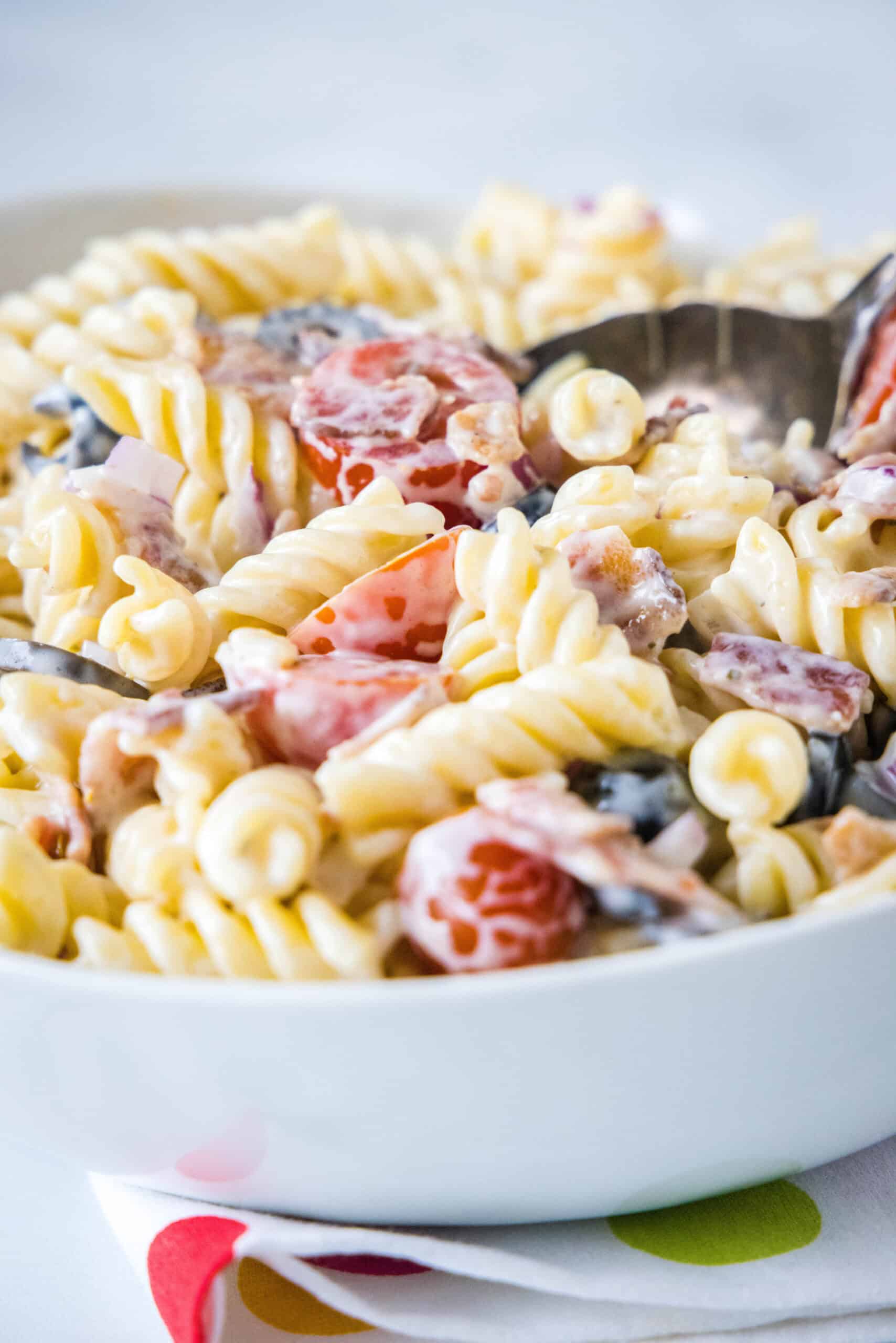 Ranch pasta salad in a white bowl.