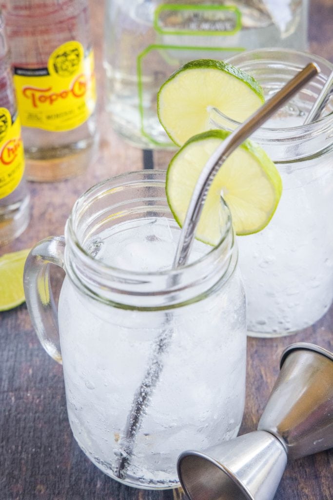 texas ranch water in a glass with a straw