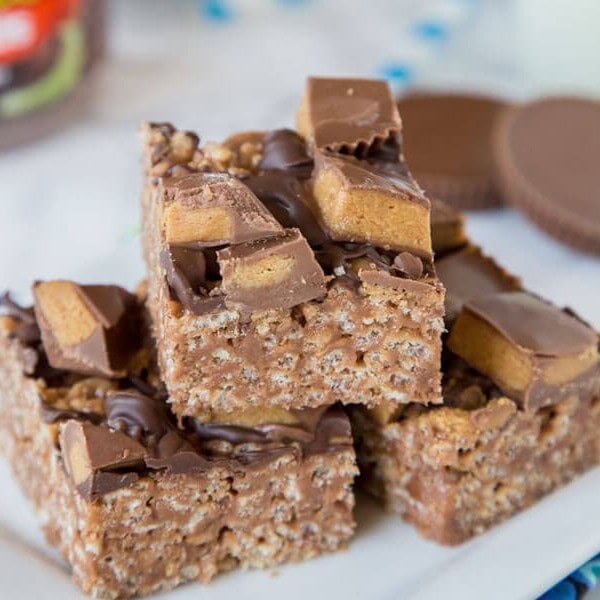 Reese's Peanut Butter Rice Krispie Treats - An easy Rice Krispie treat made with Reese's peanut butter spread, topped with chocolate and peanut butter cups!
