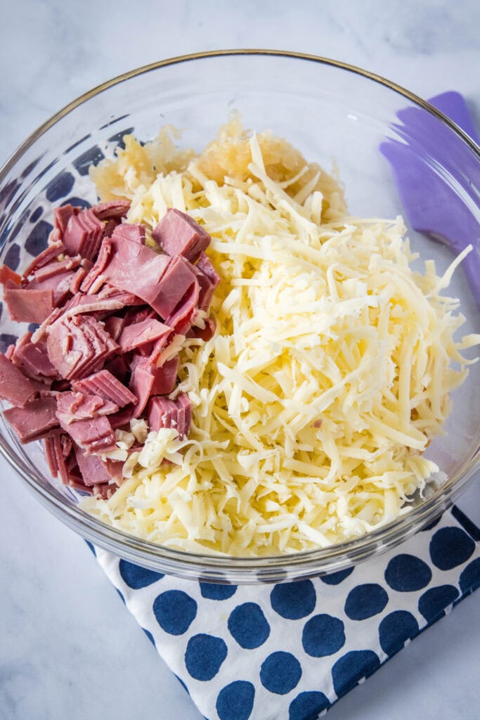 reuben dip ingredients in a mixing bowl